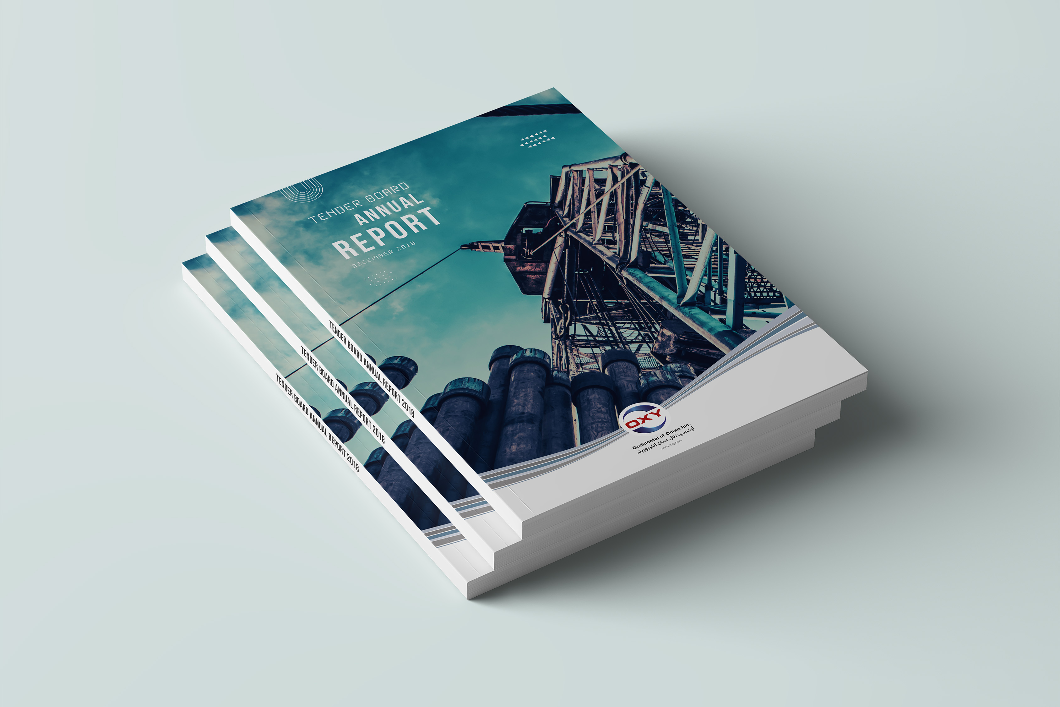 3D mockup of the Occidental Oman Tender Board Annual Report cover and interior pages.